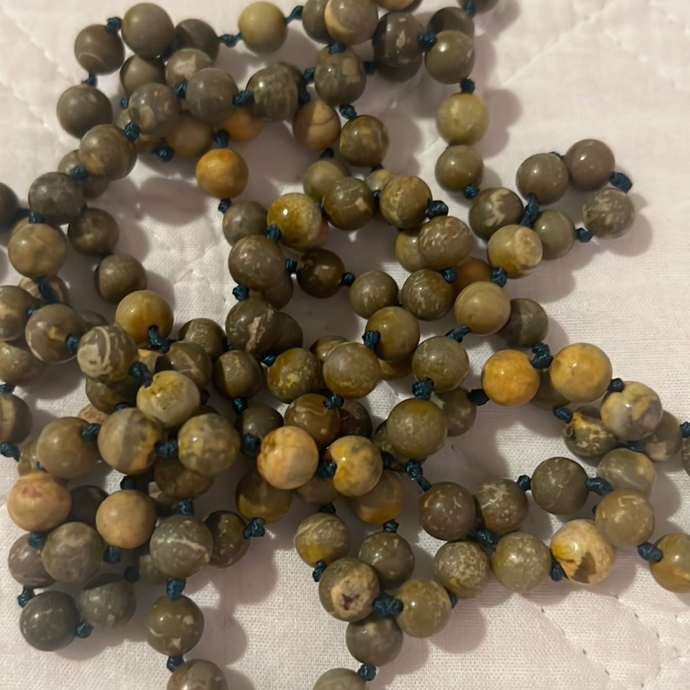 Long Bead Necklace. Green/Brown in color.